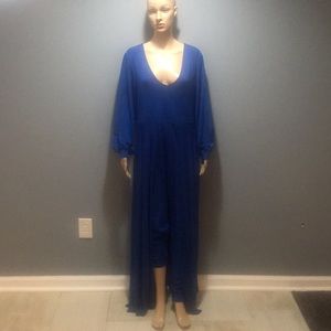 Blue jumpsuit with a cape connect